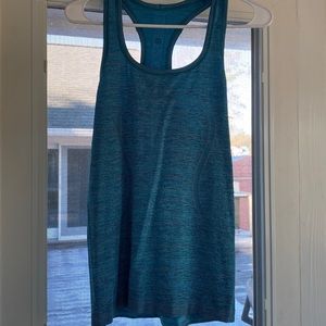 Lululemon workout tank. Beautiful teal color.  Smoke free home